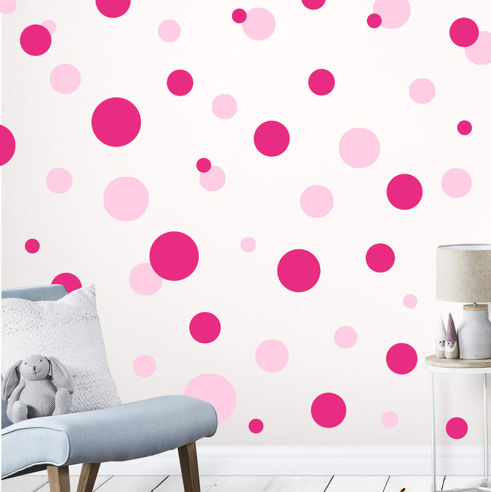 Create-A-Mural polka-dot wall decals closeup shows vibrant pink dots for playful walls.