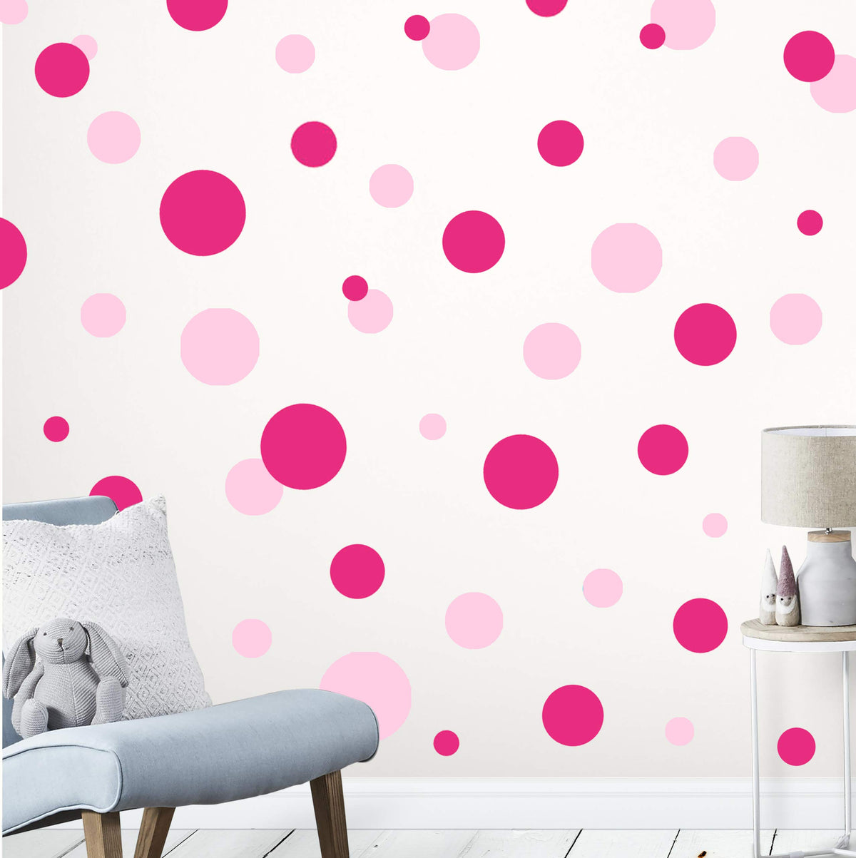 Create-A-Mural polka-dot wall decals closeup shows vibrant pink dots for playful walls.