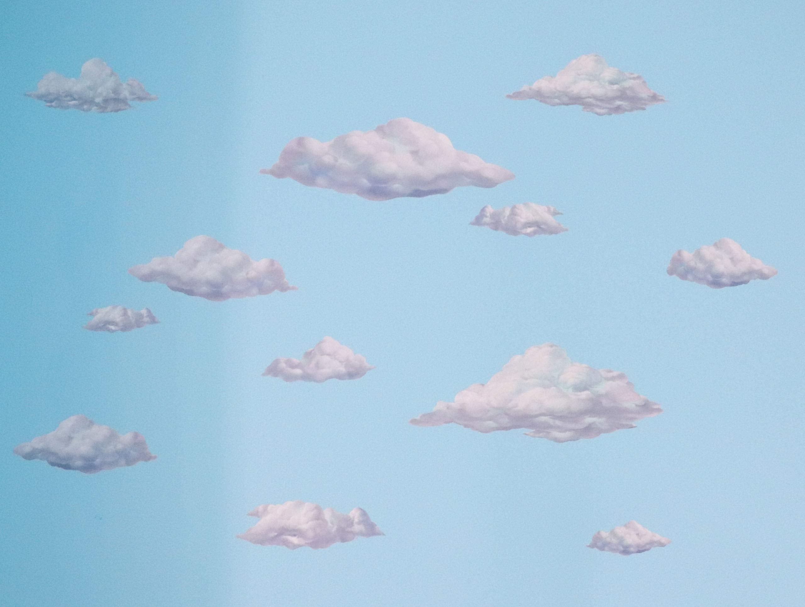 Create-A-Mural Sky Cloud Wall Decals help transform walls into a playful playroom scene.