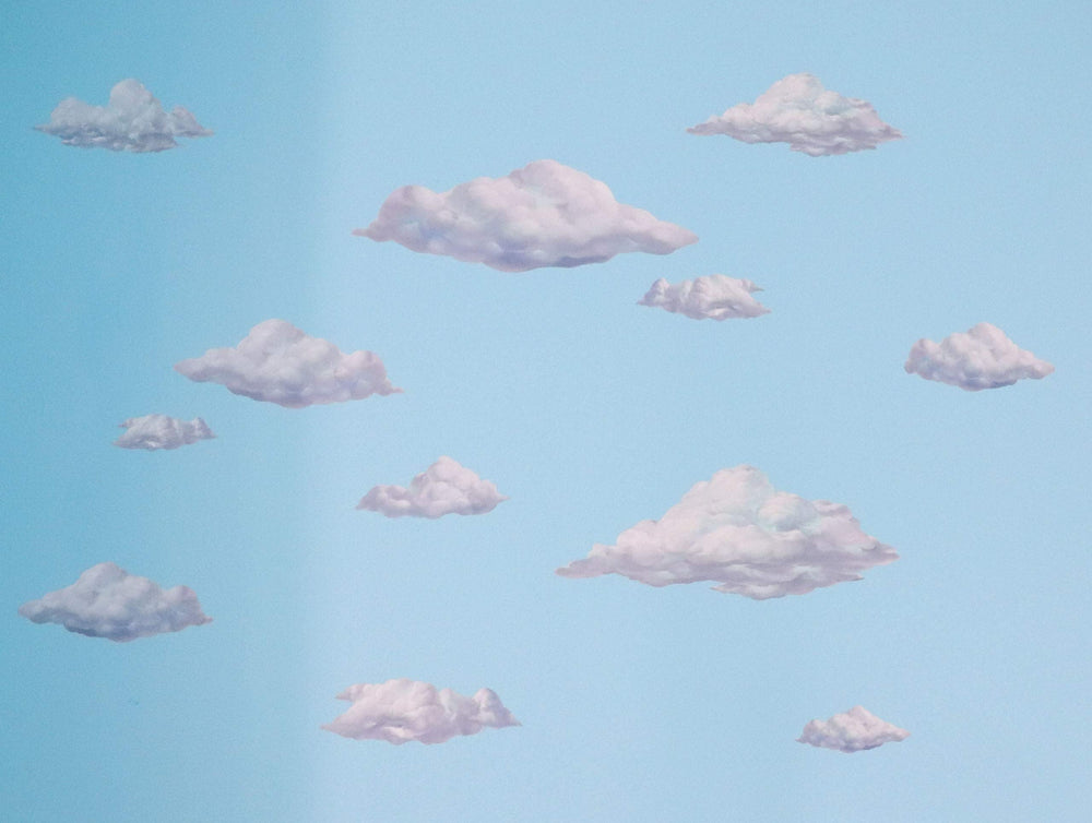 Create-A-Mural Sky Cloud Wall Decals help transform walls into a playful playroom scene.
