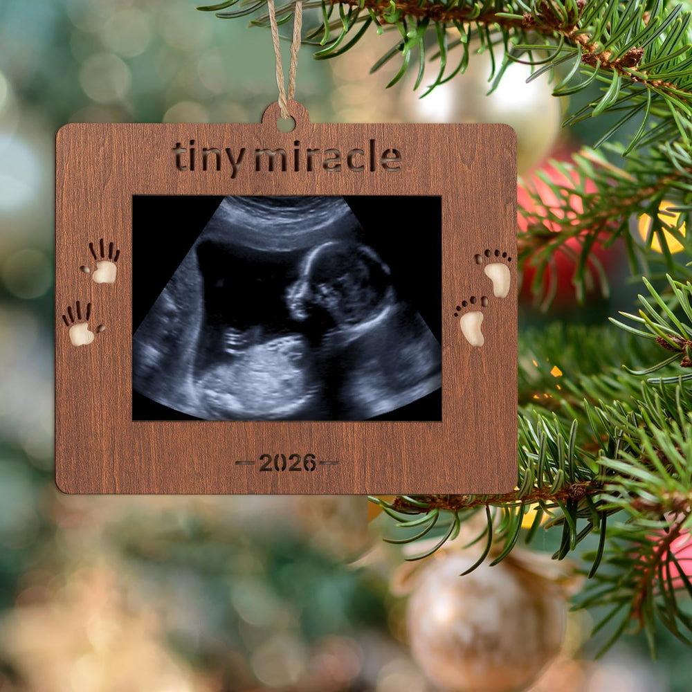 Creawoo wooden sonogram frame carved hands and feet detail emphasizes craftsmanship and heirloom appeal