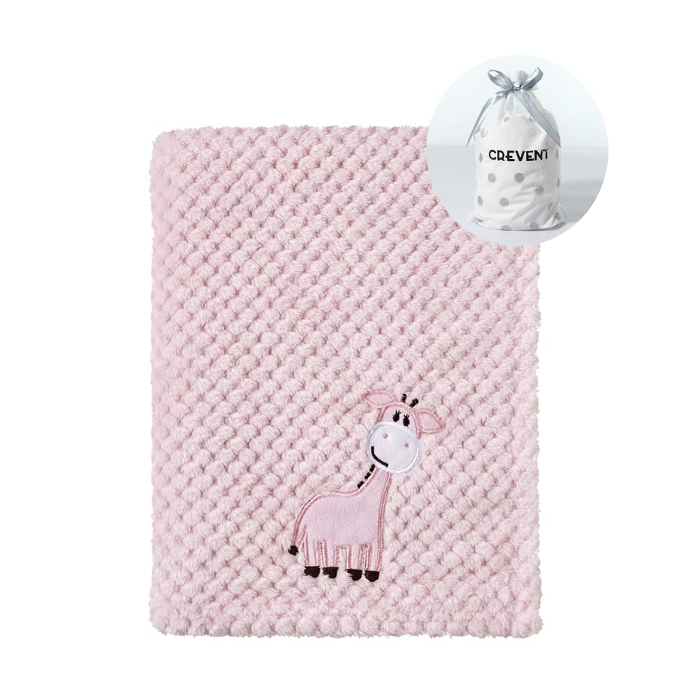 CREVENT Baby Blanket folded with pink giraffe design provides soft warmth for nap time.