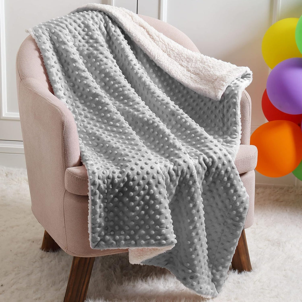 CREVENT security blanket grey close-up demonstrates secure embroidery and minimal loose parts.