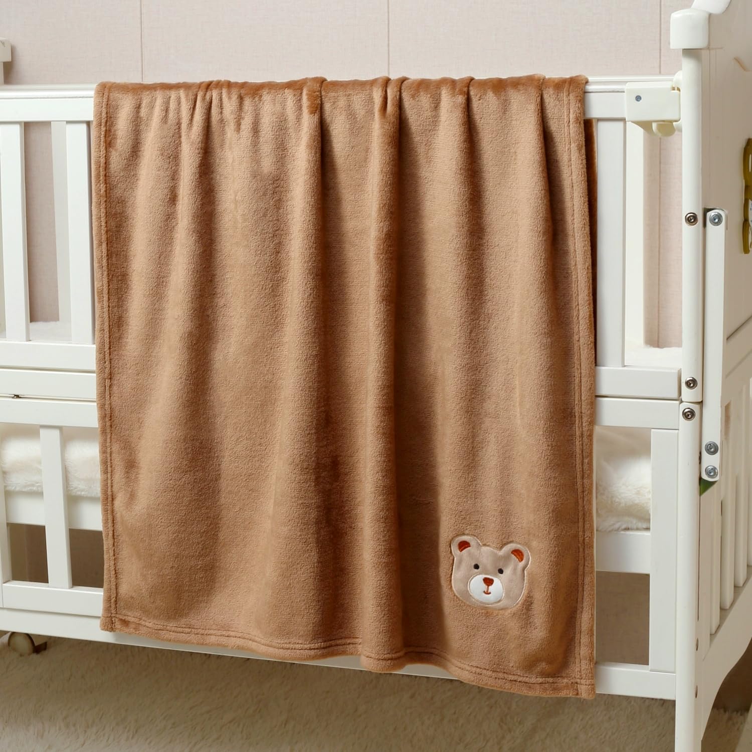 CREVENT brown bear blanket closeup soft fleece for cozy tummy time.