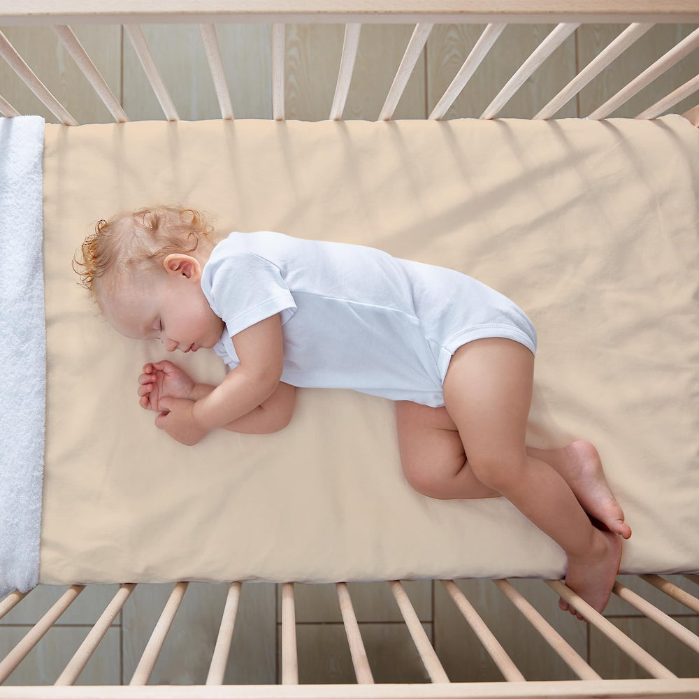 CroBlissful bear themed bedding creates a warm, photogenic nursery setting