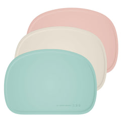 Cuddle Campus 3-pack silicone placemats in vibrant colors for mess-free meals.