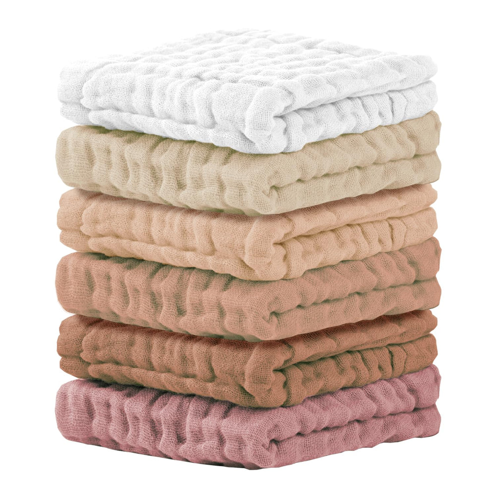 Cuddle Campus baby washcloths 6-pack folded, showcasing soft muslin texture for newborn bath time.
