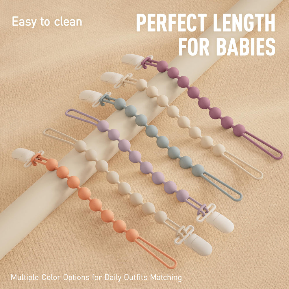 Cuddle Campus neutral-colored pacifier clip for versatile baby use.