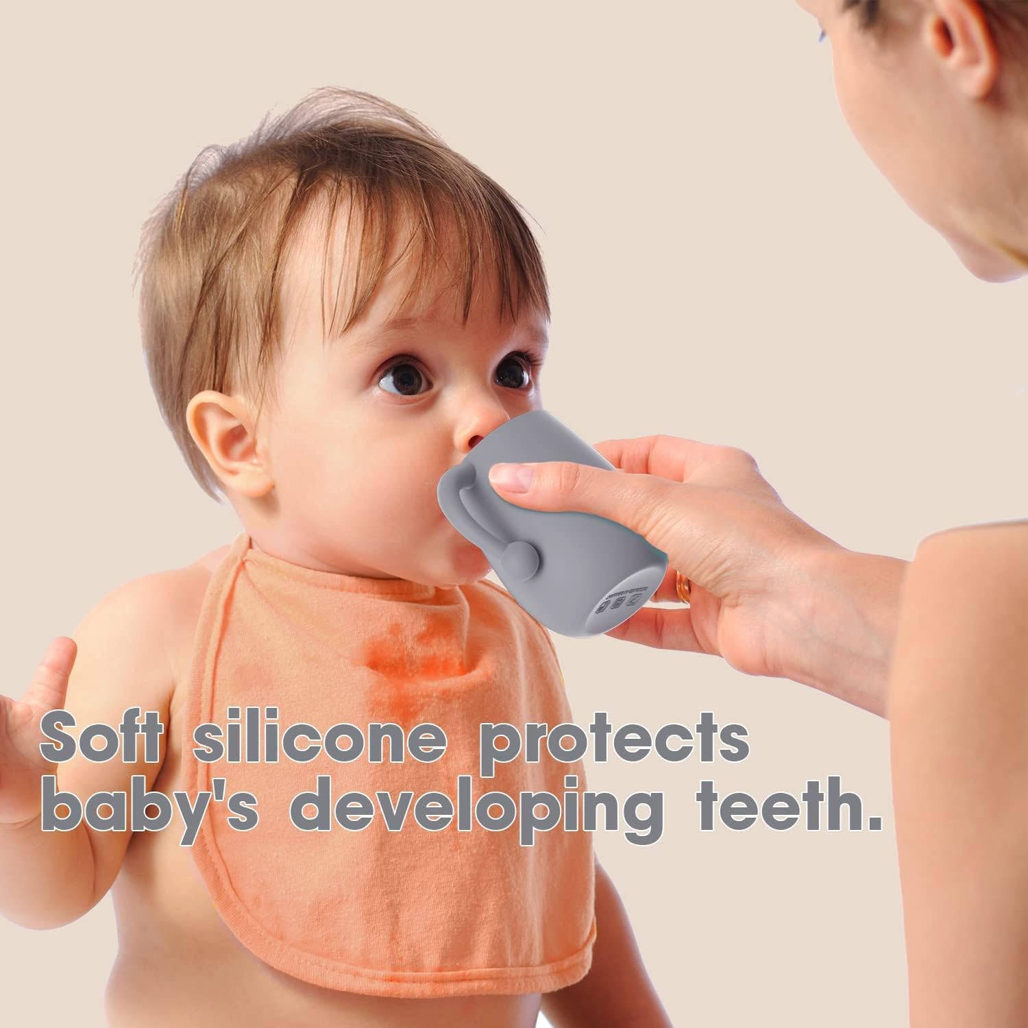 Cuddle Campus silicone baby training cup with lid provides a non-spill transition.