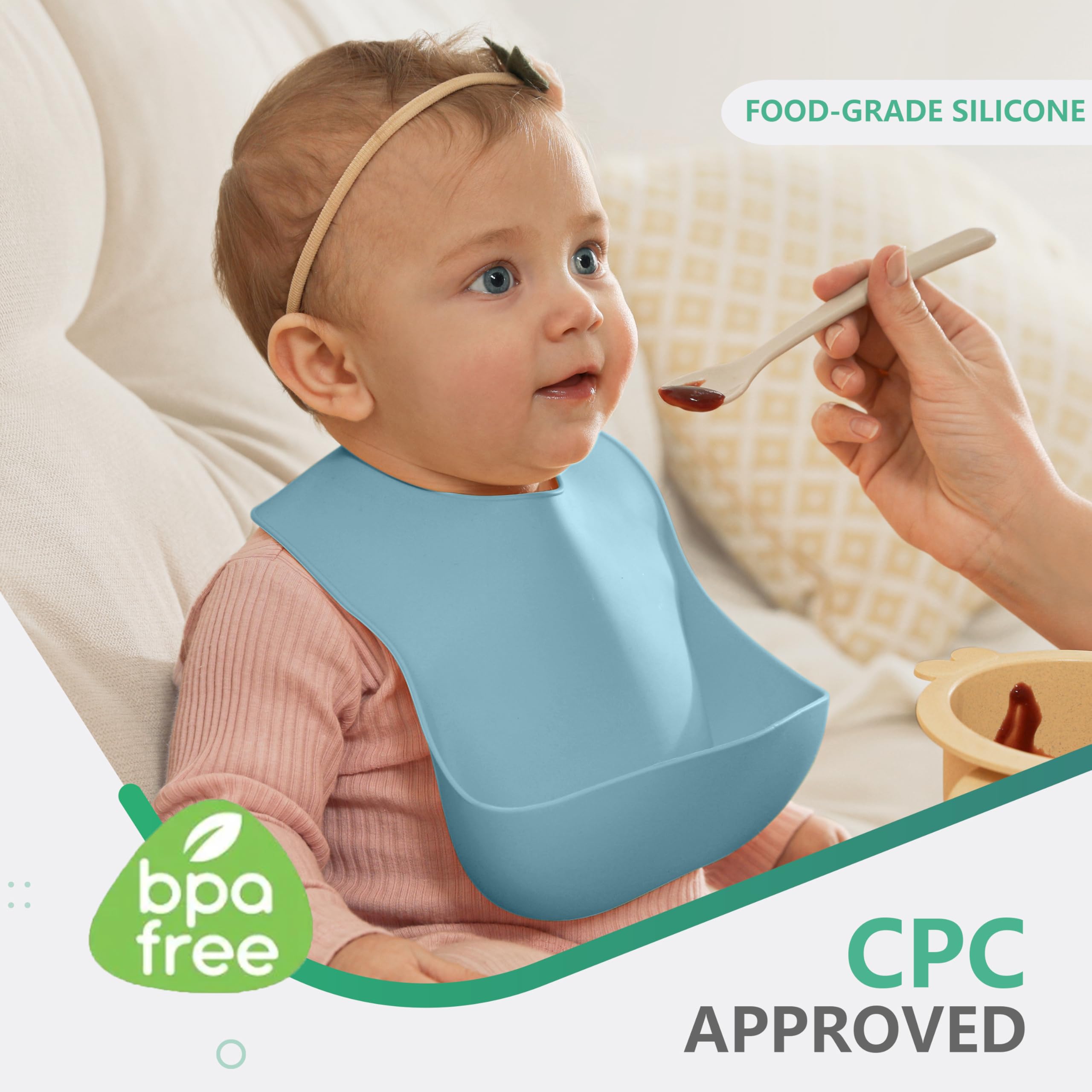 Cuddle Campus silicone bib showing expandable pocket for catching food messes