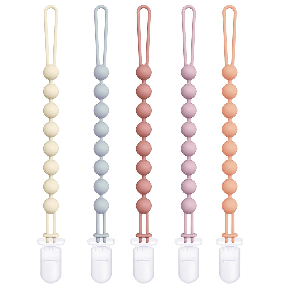 Cuddle Campus silicone pacifier clip with one-piece design for secure attachment.