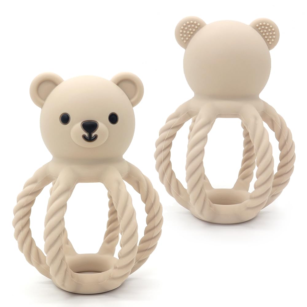 CuddleCubs bear toy rattle demonstrates rustling sound to engage baby's attention and motor skills.