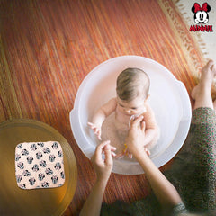 Cudlie Minnie-face towel detail emphasizes cute print and comforting bath experience.