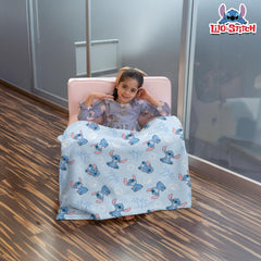 Cudlie Stitch Blanket blue edge detail highlights softness.