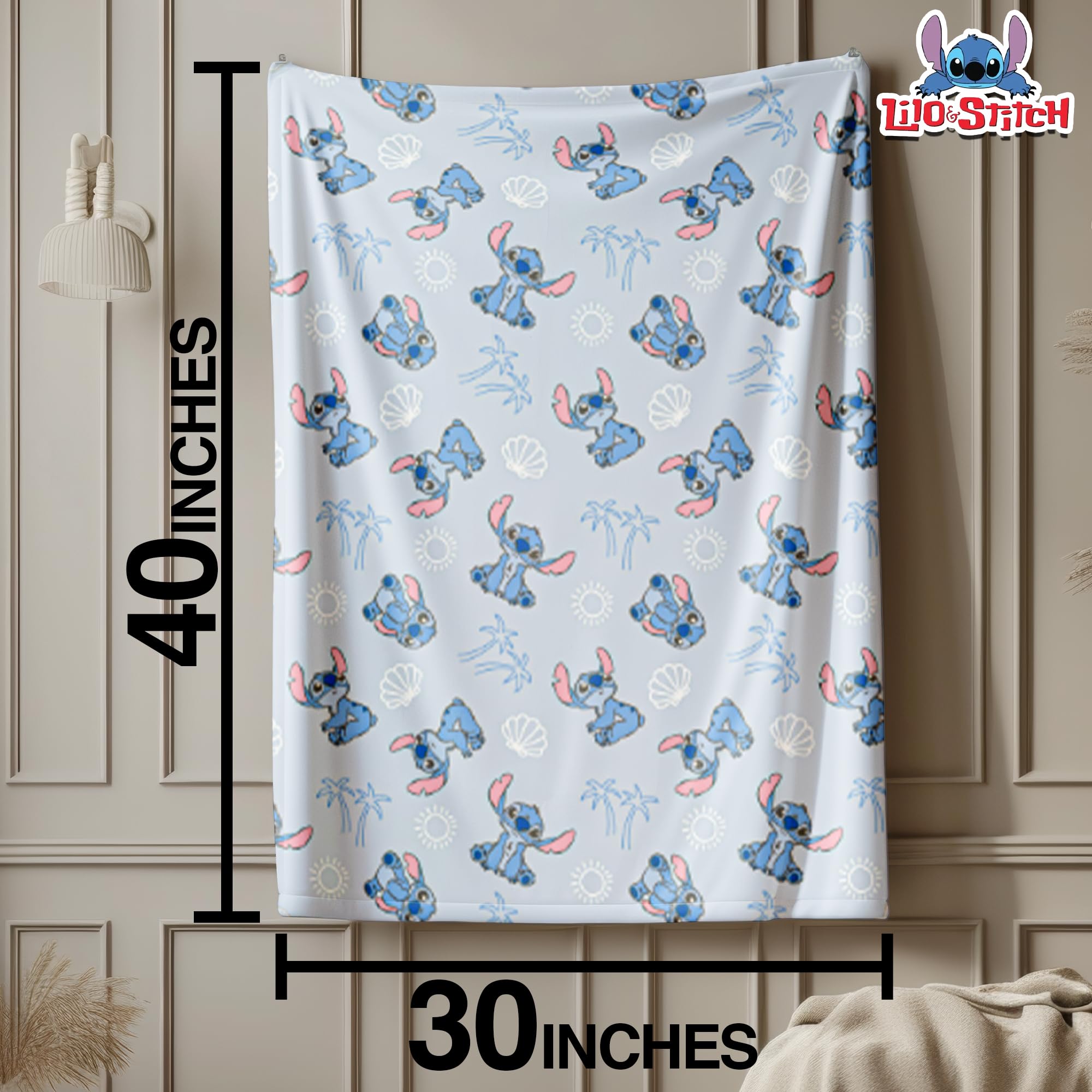 Cudlie Stitch Blanket blue fold shows versatile travel companion.