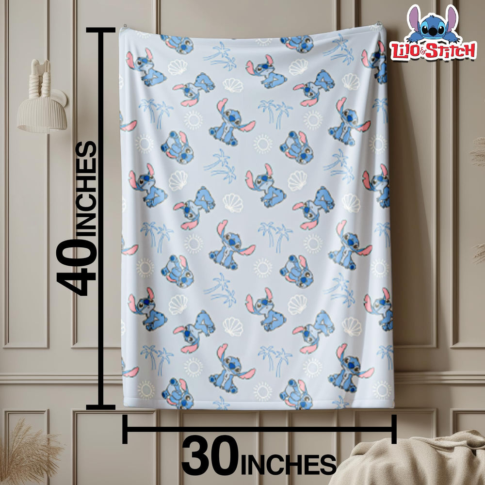 Cudlie Stitch Blanket blue fold shows versatile travel companion.