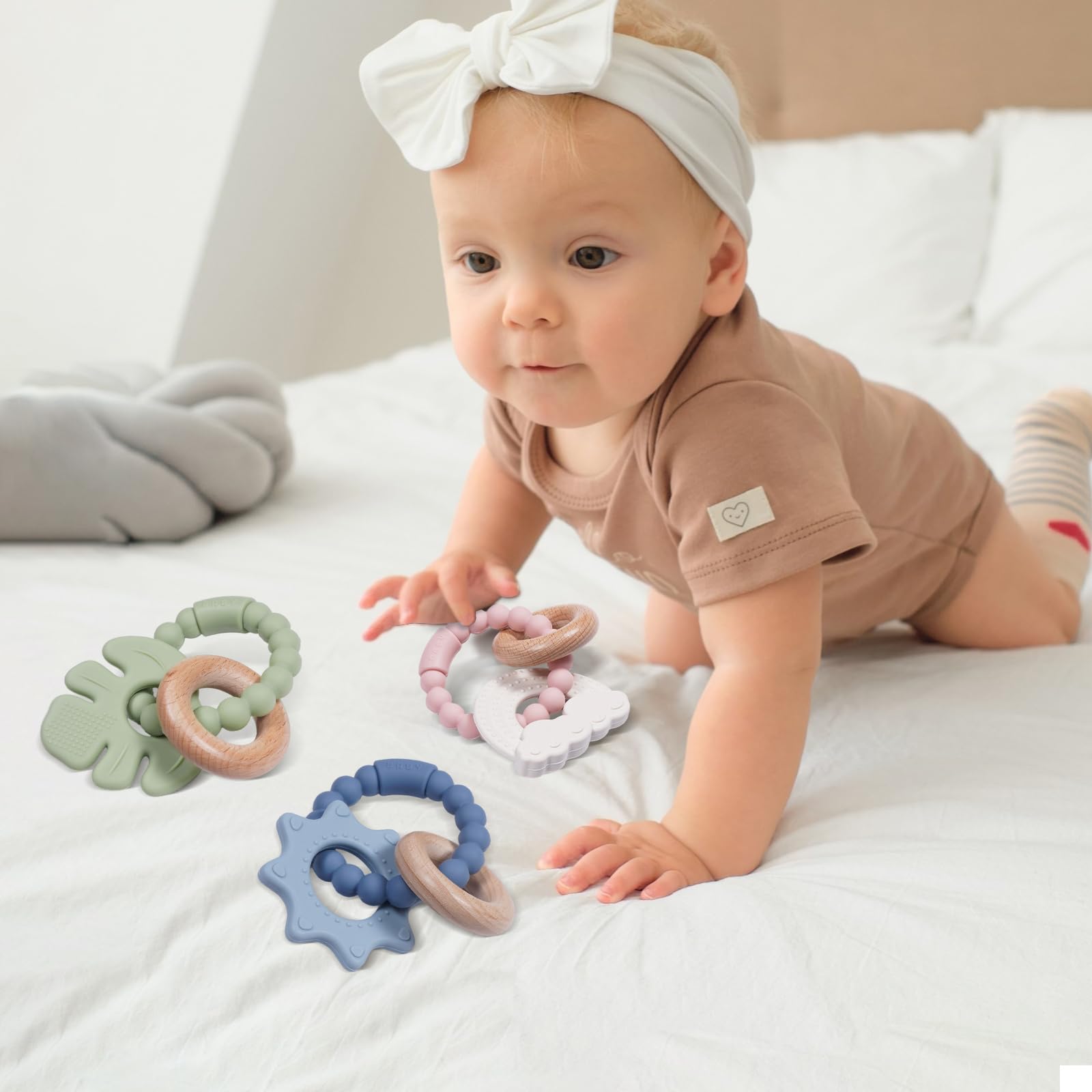 Cuebo ergonomic ring teether designed for secure grasp and chewing