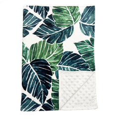 Culclendy baby blanket with green leaves design enhances nursery decor and cozy cuddles