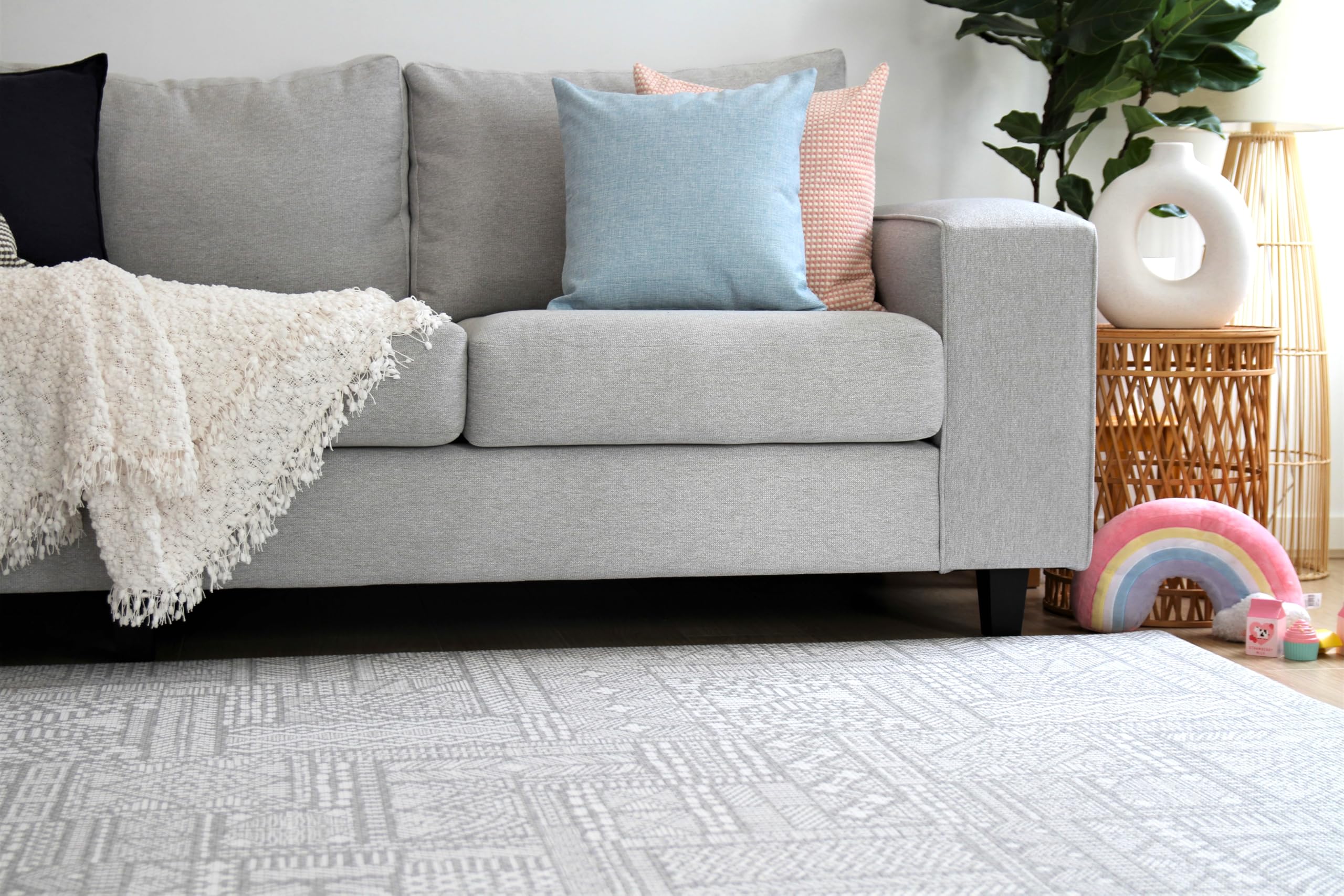 Cushmat Explorer gray-sand living-room-rug offers stylish, safe play space.