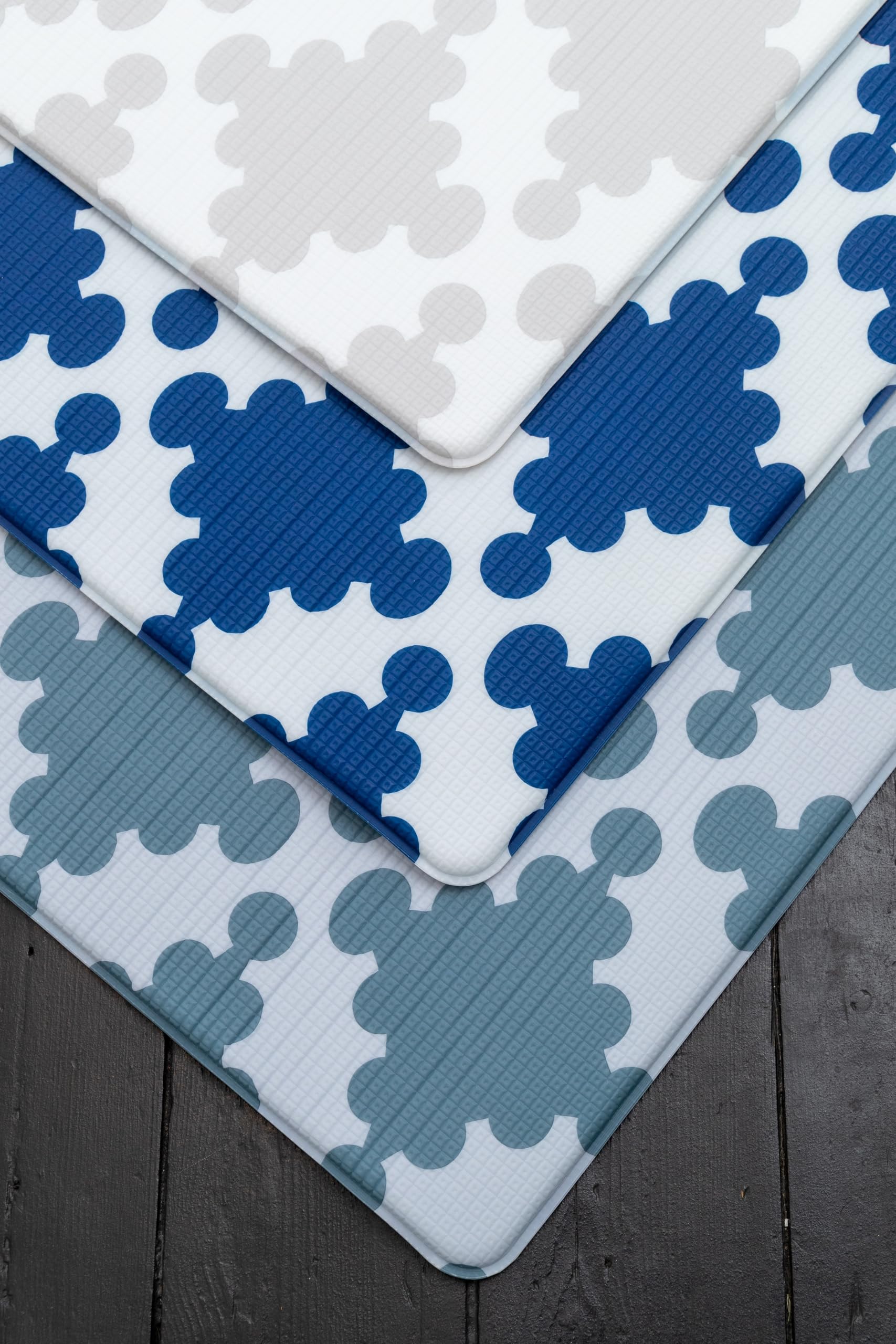 Cushmat living room rug-style versatility lets babies play and grownups relax