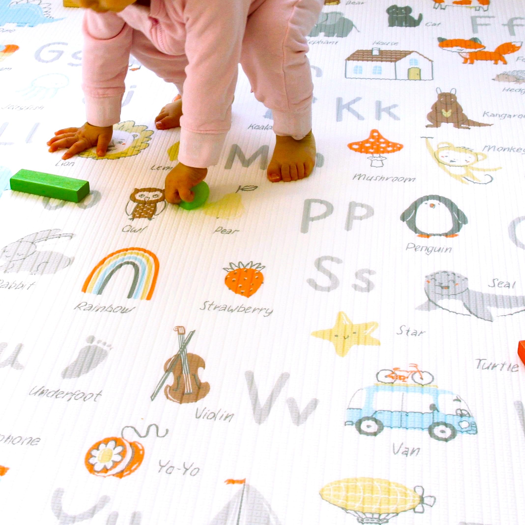 Cushmat memory foam close-up shows cushioned surface ideal for tummy time.