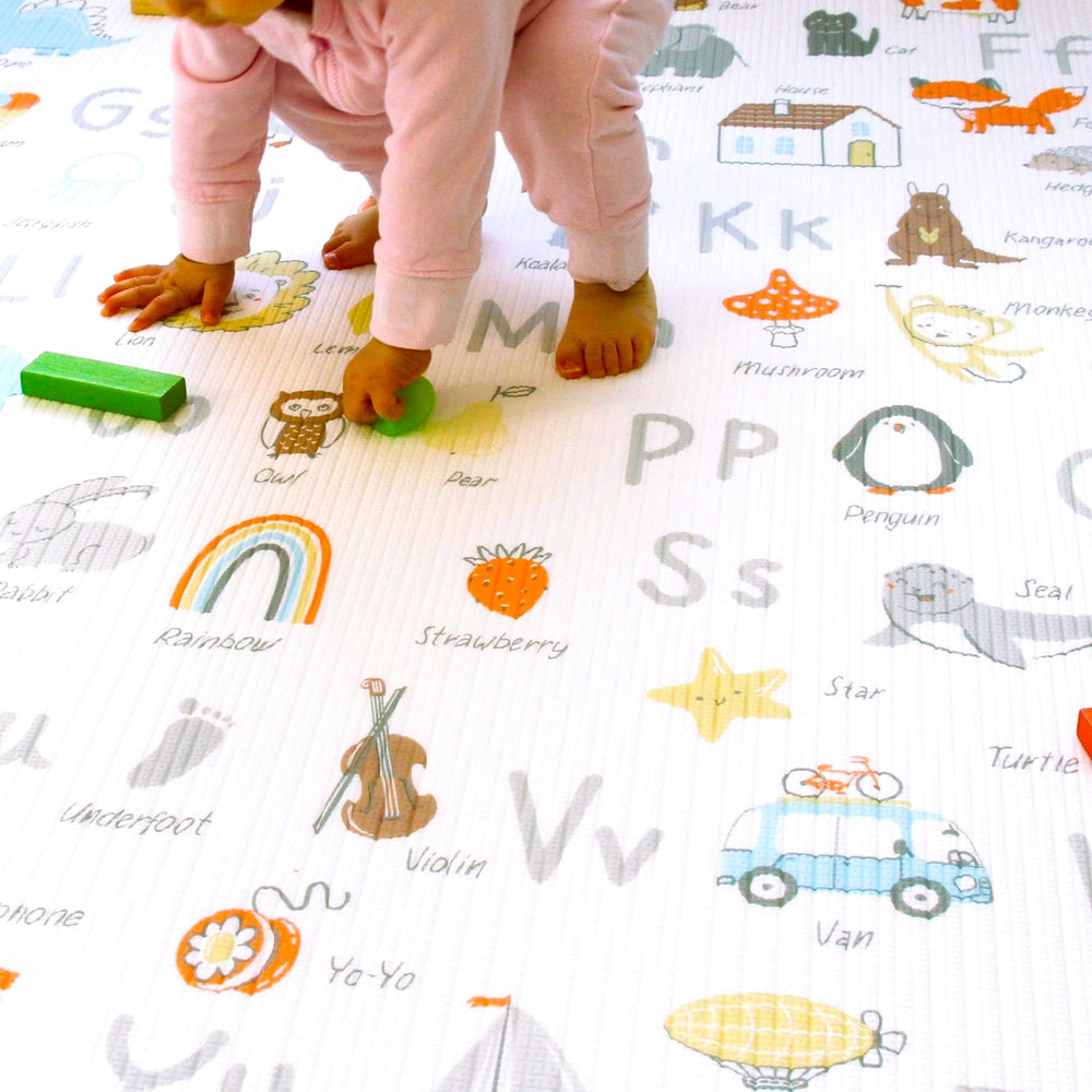 Cushmat memory foam close-up shows cushioned surface ideal for tummy time.