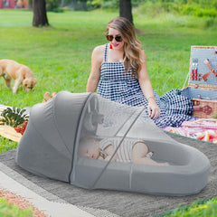 Cutebeams travel bed folded in carrying bag for easy storage.