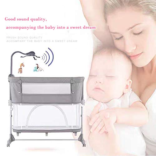 Cutie Pumpkin baby crib mobile attached to Pack N Play in use