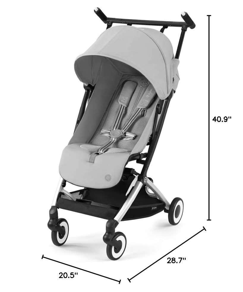 Cybex Libelle 2 fog grey in-use on airport and city streets