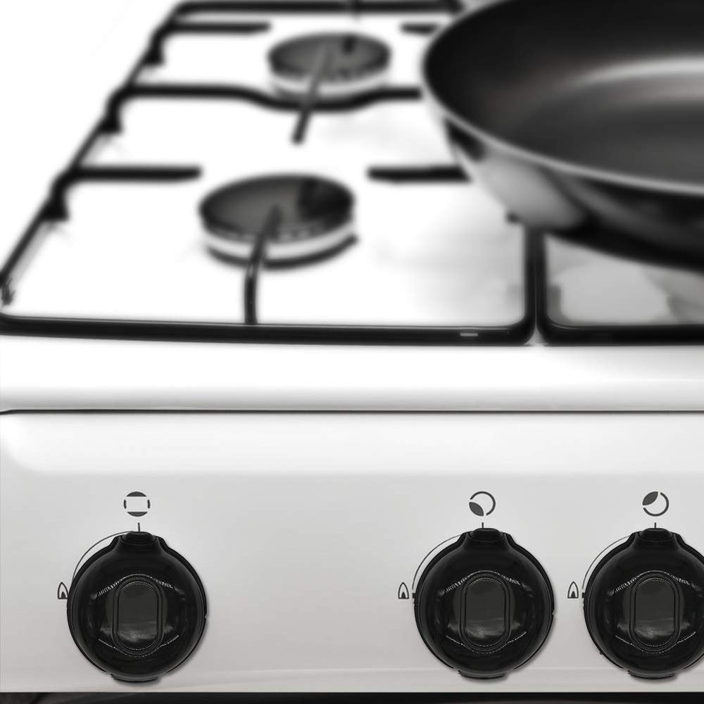 Cypropid knob covers protecting children while cooking in action.