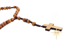 Dacaret Factory olive wood rosary laid flat showing a 15 inch length