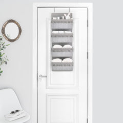 Dahey boho nursery storage on door keeps baby essentials neatly within reach.