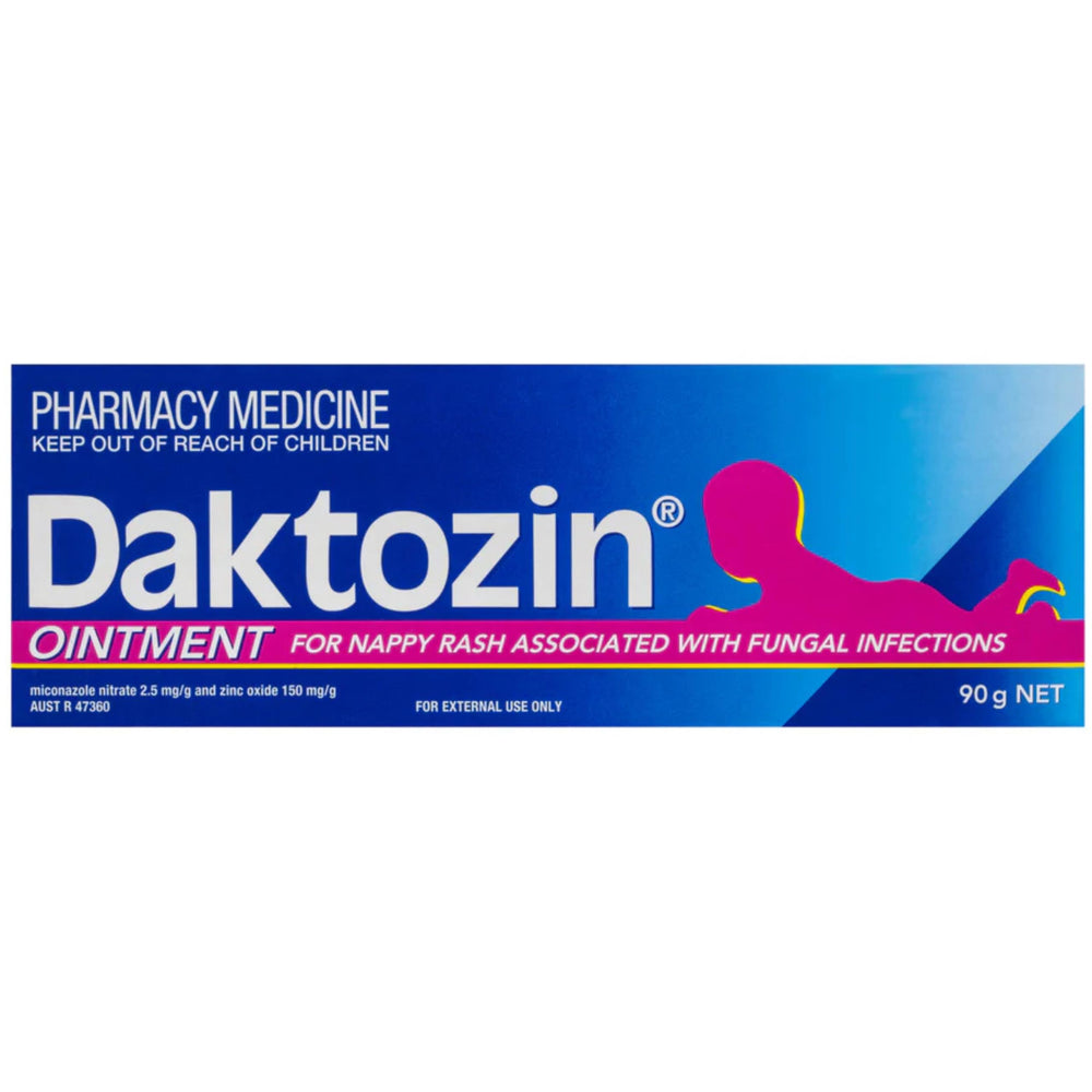 Daktozin ointment being applied gently to a baby's diaper area.