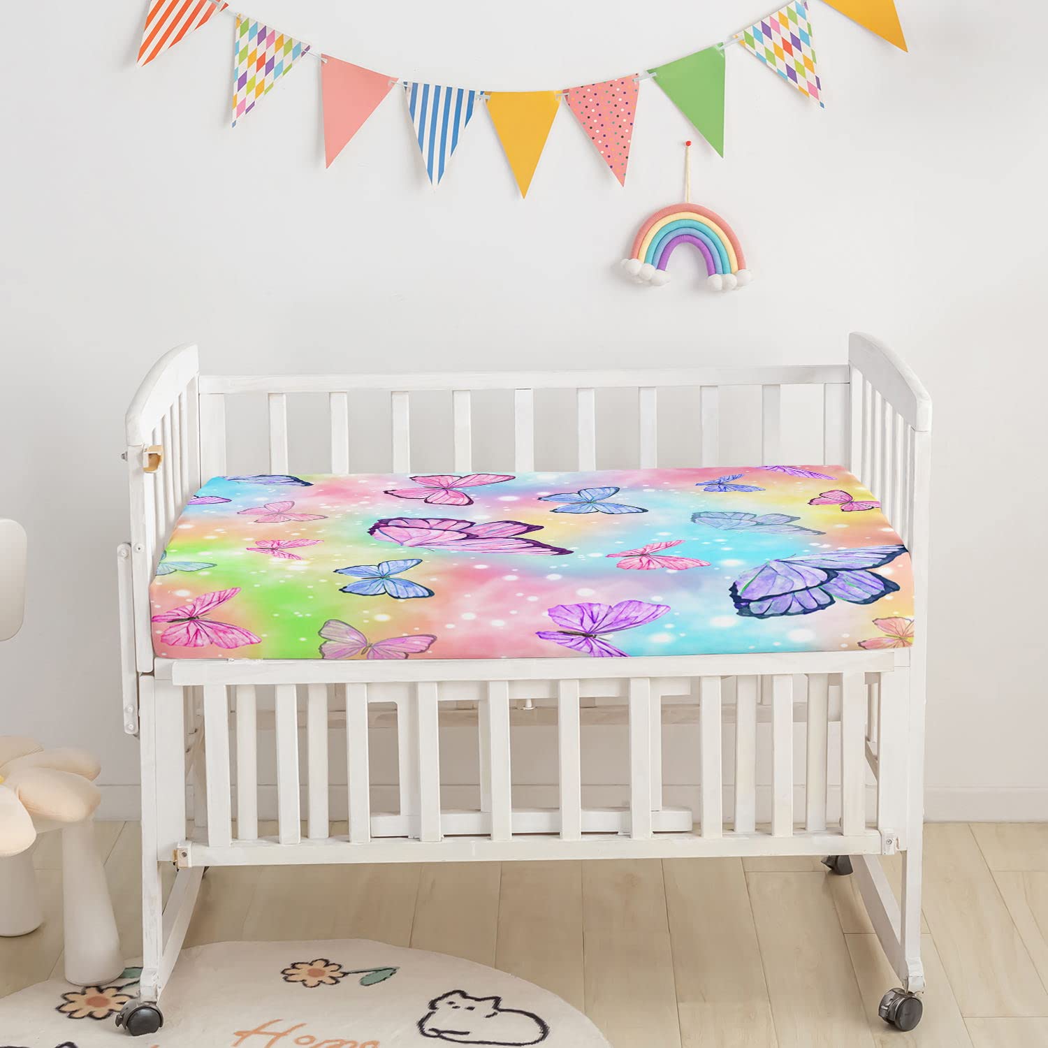 Datura Home crib bedding watercolor butterfly skirt adds decorative flair while safeguarding mattress edges
