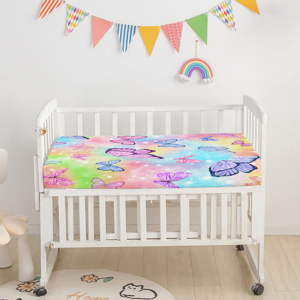Datura Home crib bedding watercolor butterfly skirt adds decorative flair while safeguarding mattress edges