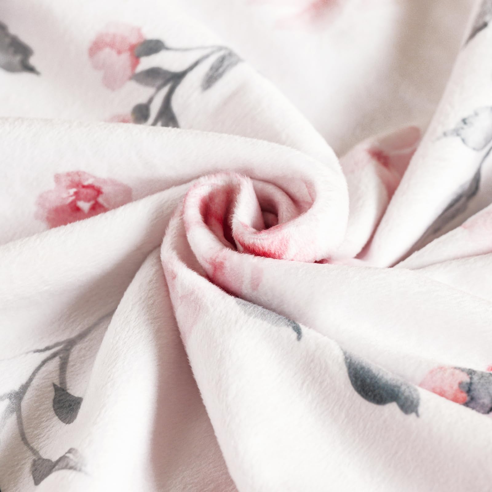 David's Kids blanket shown as swaddle or nursing wrap during outings.