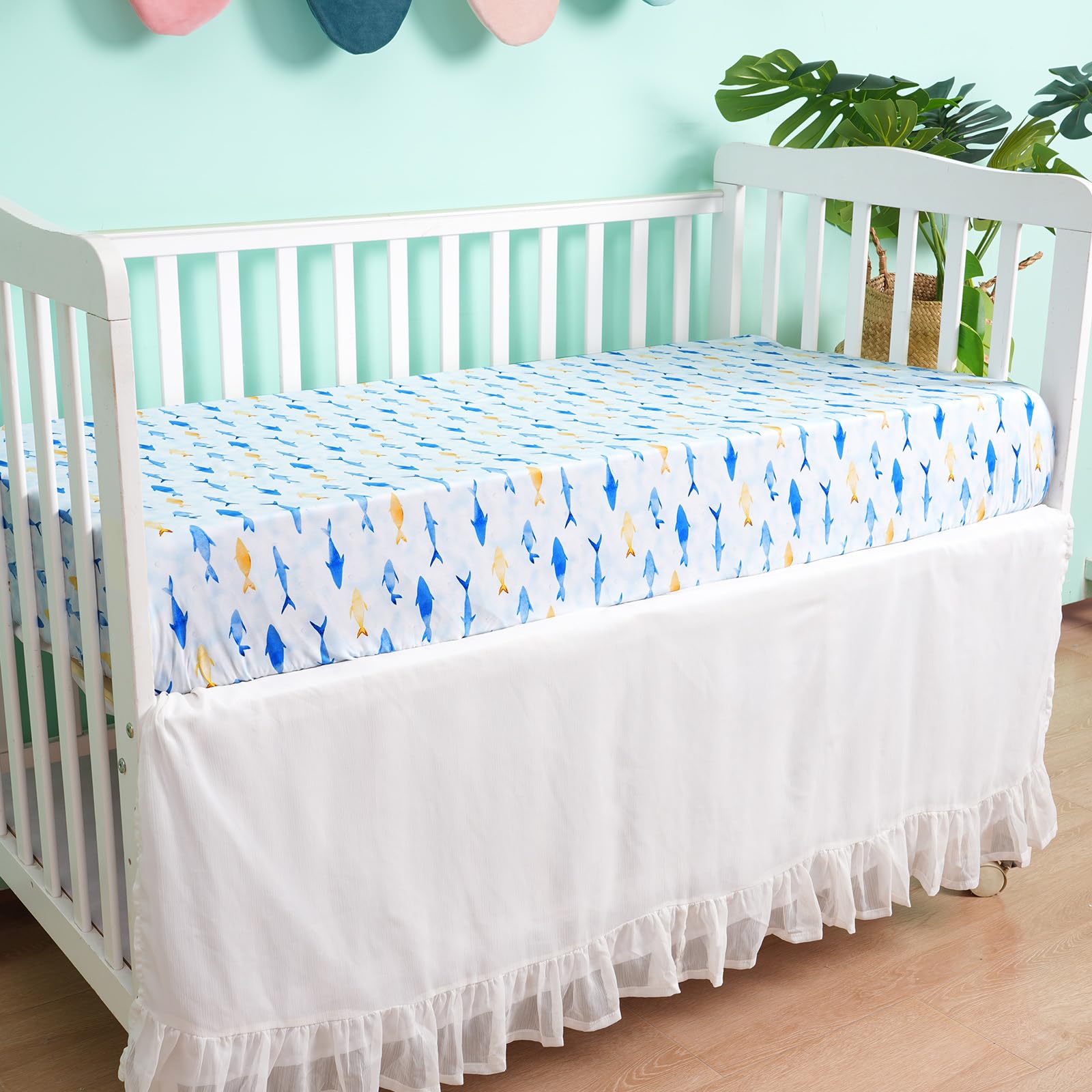 David's Kids 28x52 fit demonstrates secure, snug fit on standard cribs and toddler mattresses.