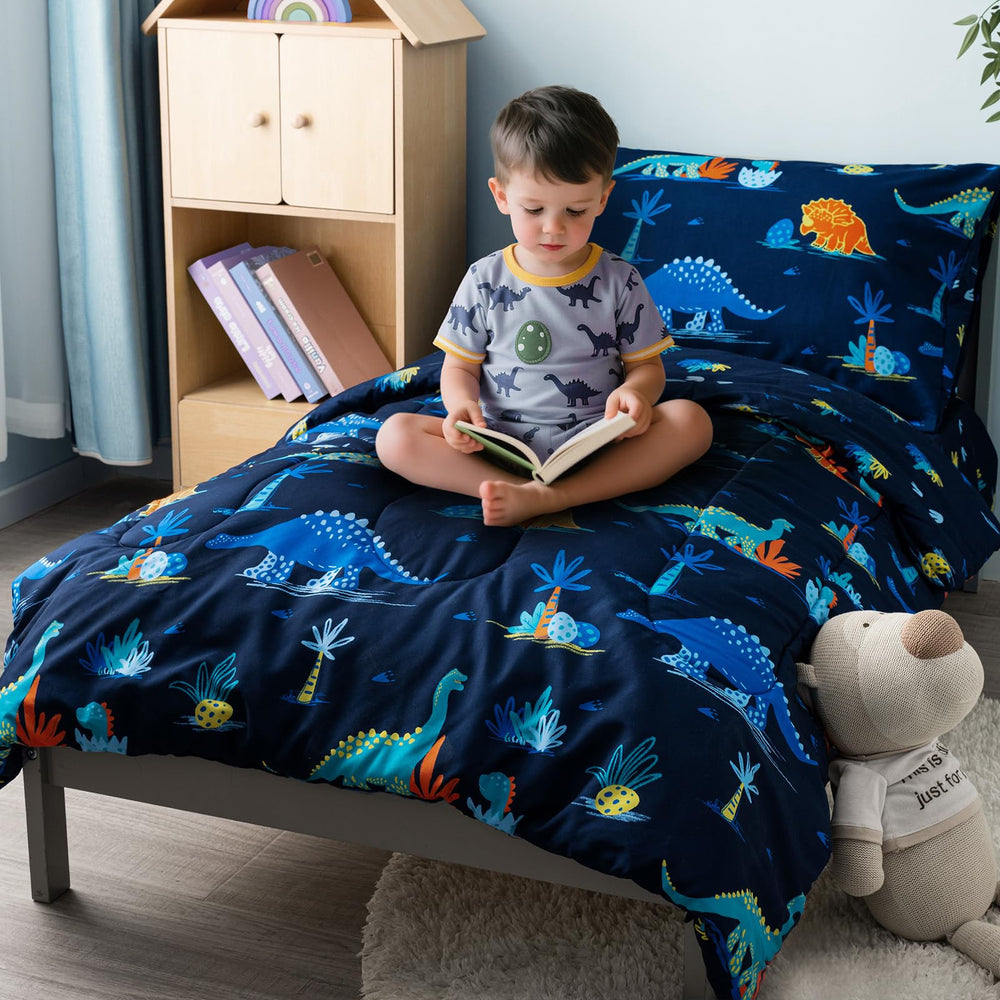 David's Kids dinosaur navy fitted sheet snugly fits a standard toddler mattress.