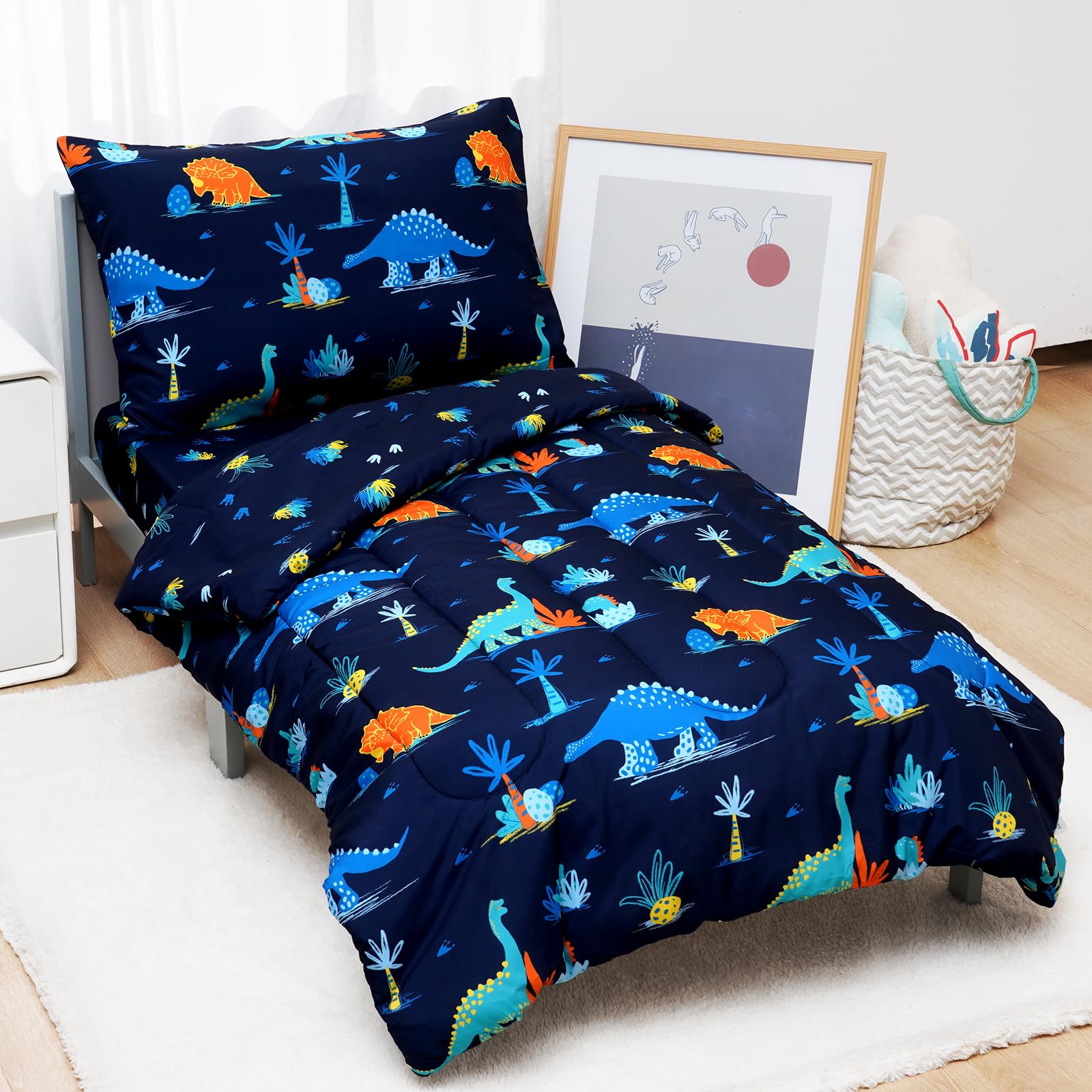 David's Kids pattern detail reveals a playful dinosaur motif for bedtime.