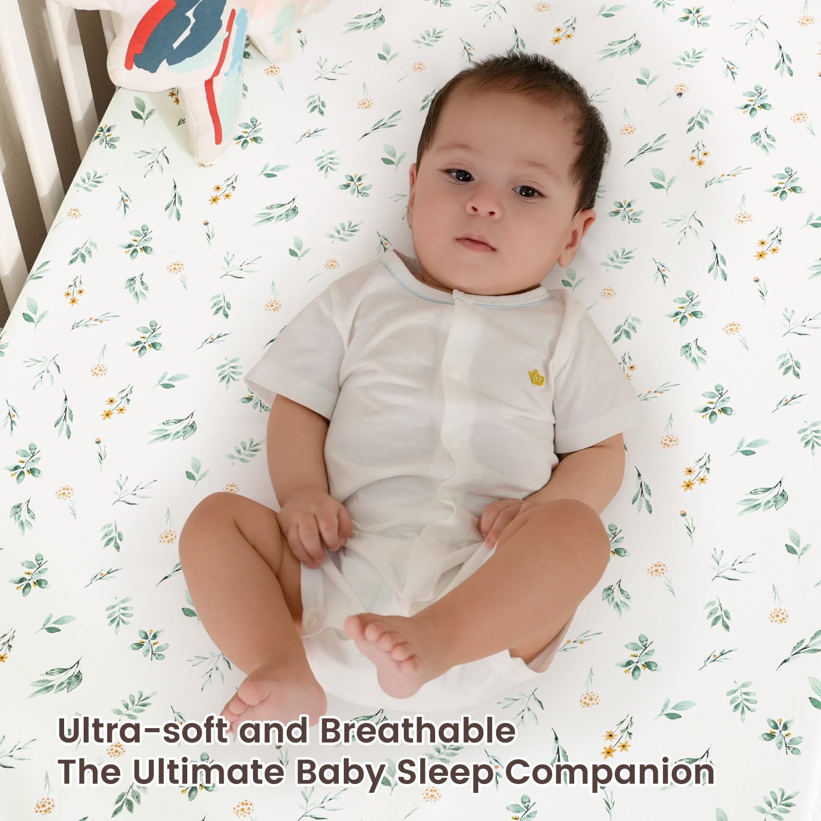 Davids Kids floral pattern bassinet sheet keeps baby snug during sleep.