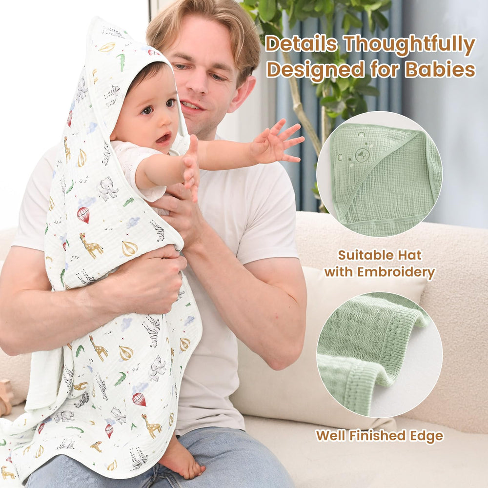 David's Kids hooded towel wrapped on baby delivers cozy warmth after bath.