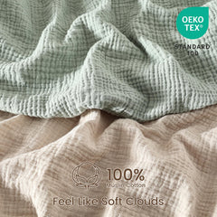 David's Kids muslin crib sheets in sage-green folded, cozy and skin-friendly.