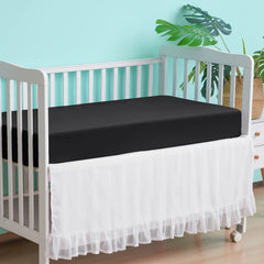 David's Kids waterproof crib sheets folded neatly for compact storage