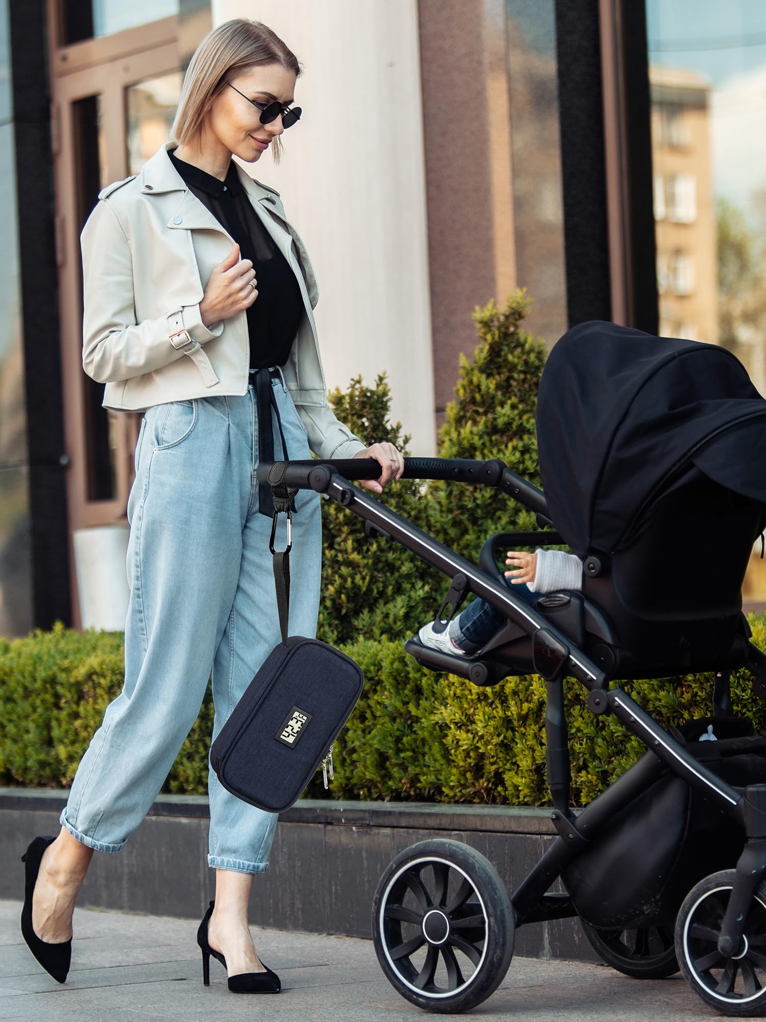 DawnBox attached to stroller, showcasing portable travel use