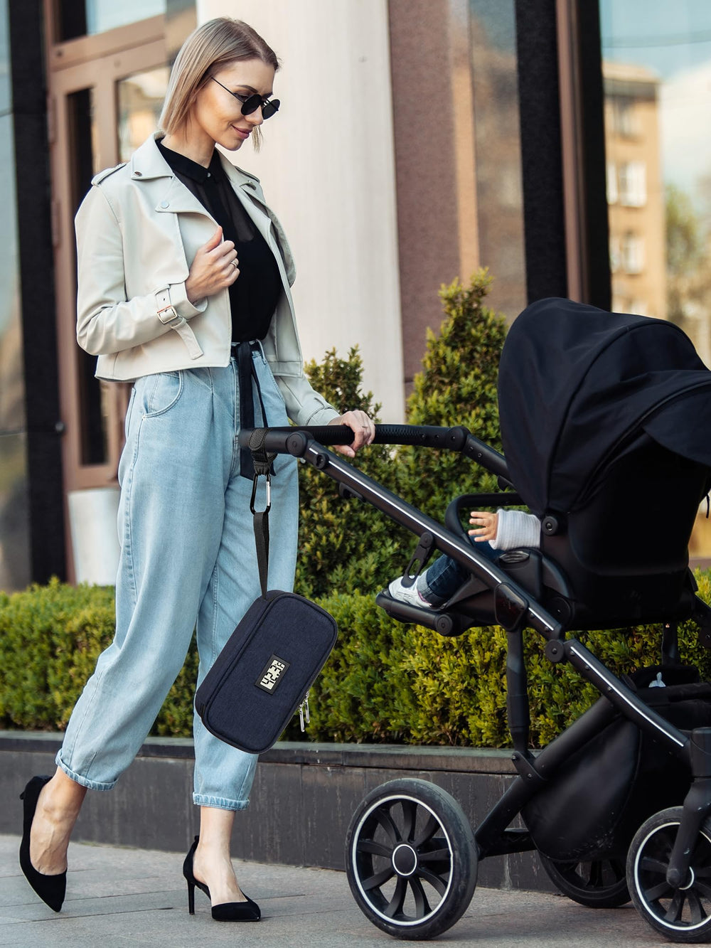 DawnBox attached to stroller, showcasing portable travel use