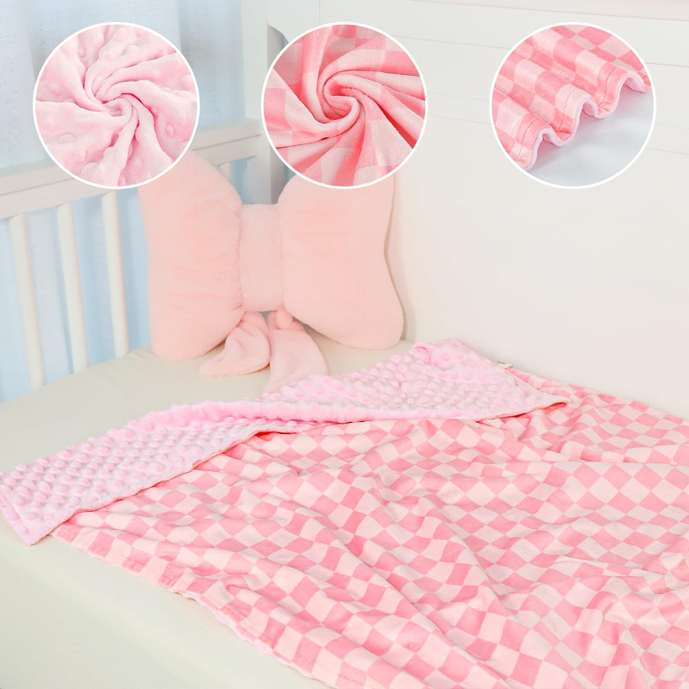 DAYEEBALL double-layer blanket with dotted back displayed for nursery ambience and tactile interest.