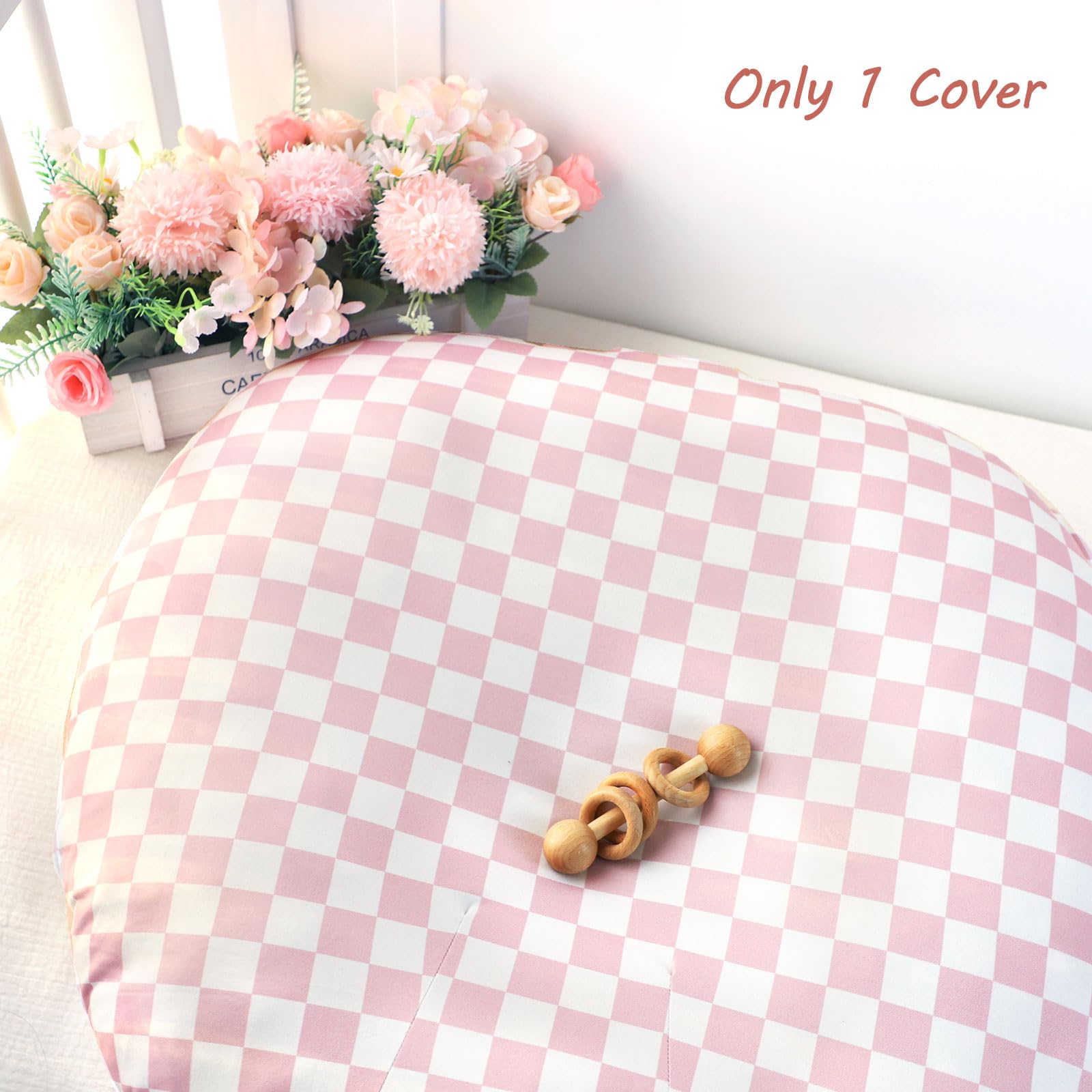 DAYEEBALL pink checkerboard pattern keeps nursery stylish while protecting the lounger.