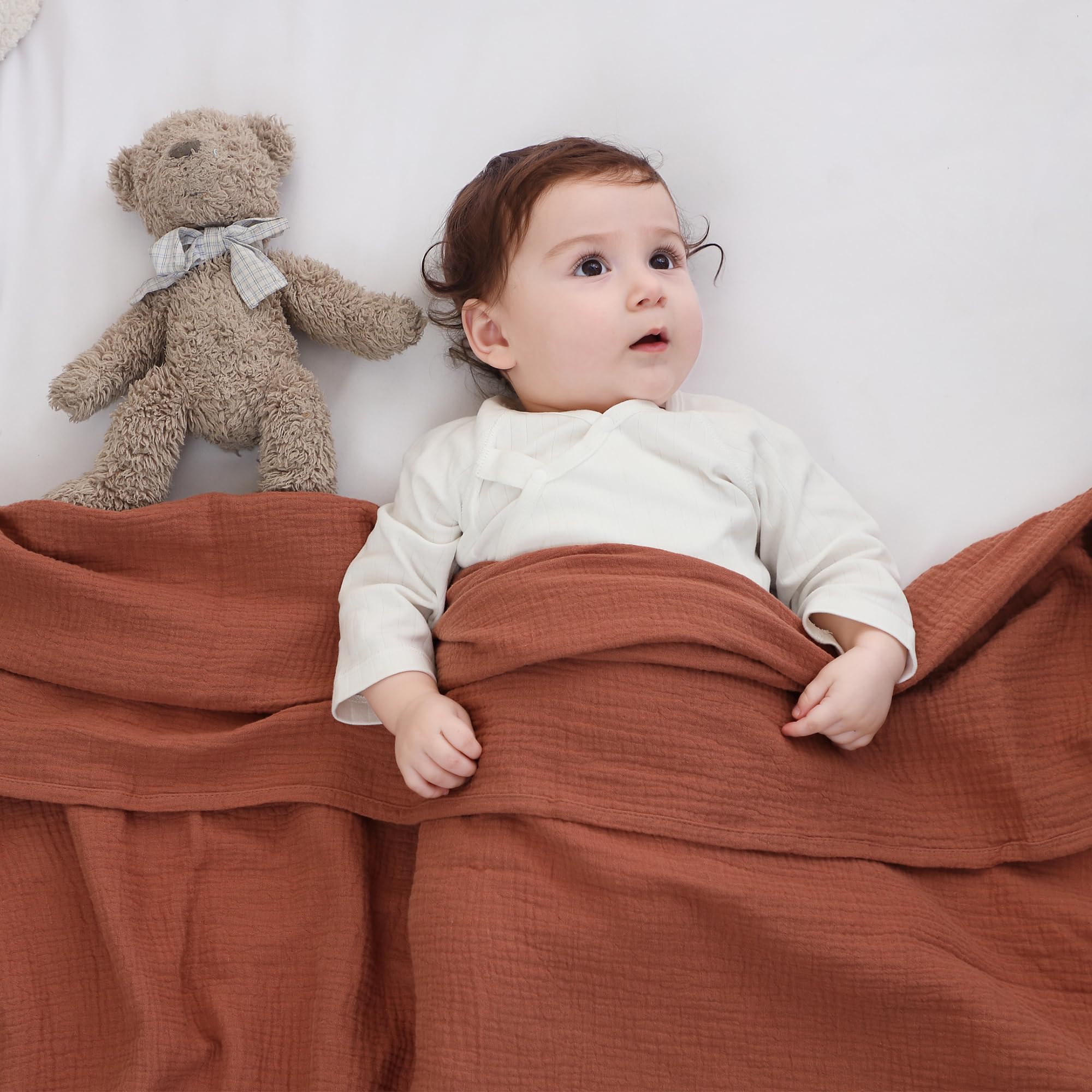 DaysU muslin swaddle brown-lilac-ash folded demonstrates compact size and easy packing.