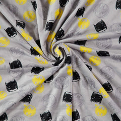 DC Comics Batman blanket batman-masks-print illustrates multicolored masks and Bat-Symbols for playful nursery decor.