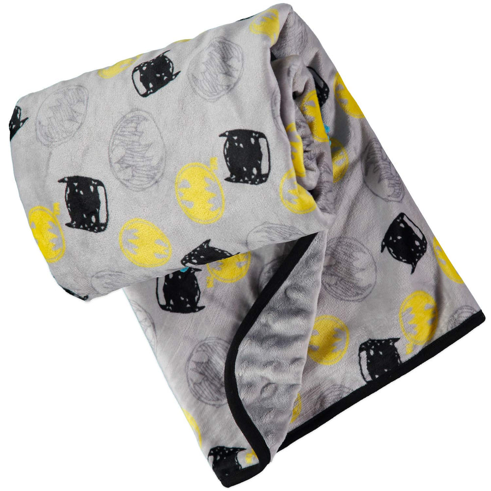 DC Comics Batman blanket textured side detail highlights tactile texture for baby exploration.